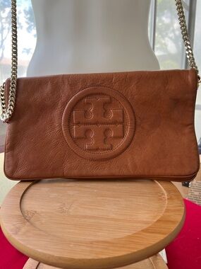 Tory Burch Reva Bombe Clutch Leather Crossbody with Logo and Chain Strap